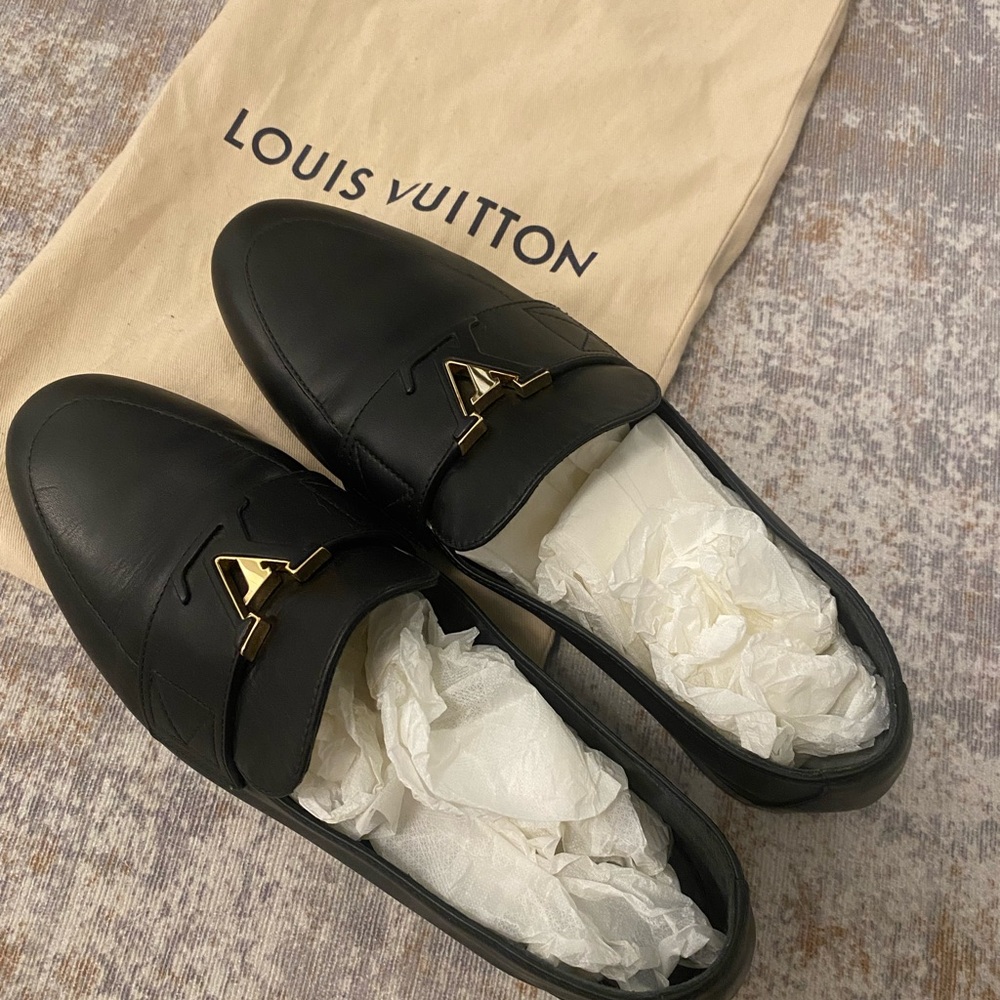 Louis Vuitton Black Leather Loafers with Gold Emblem